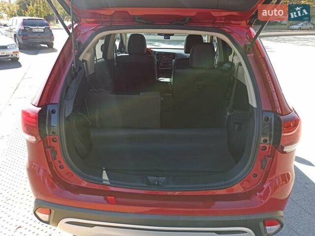 Червоний Міцубісі Аутлендер, об'ємом двигуна 2.4 л та пробігом 70 тис. км за 18500 $, фото 5 на Automoto.ua