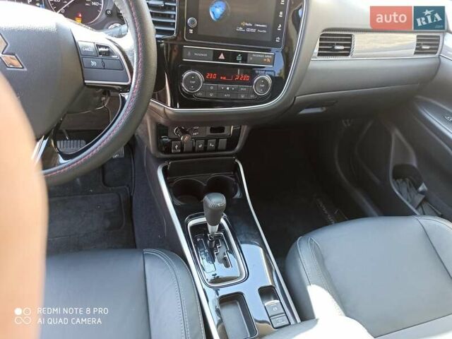 Червоний Міцубісі Аутлендер, об'ємом двигуна 2.4 л та пробігом 70 тис. км за 18500 $, фото 12 на Automoto.ua