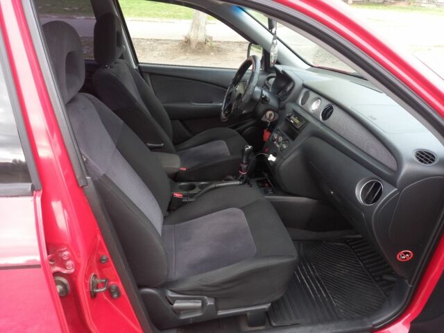 Красный Мицубиси Аутлендер, объемом двигателя 2 л и пробегом 217 тыс. км за 6250 $, фото 3 на Automoto.ua