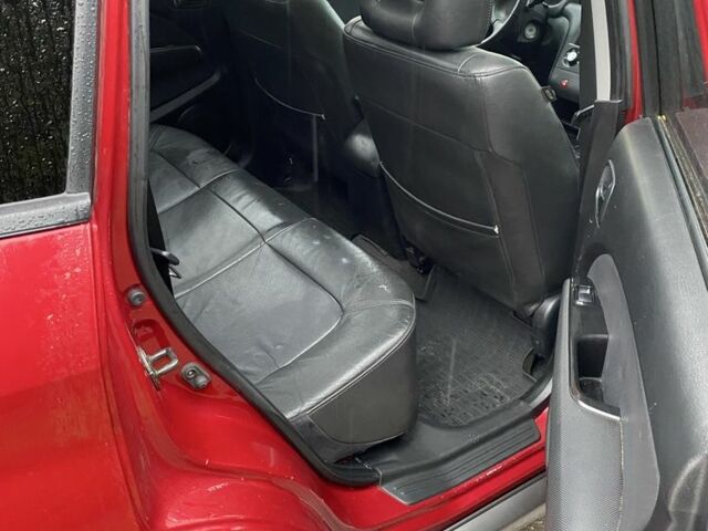 Красный Мицубиси Аутлендер, объемом двигателя 2.4 л и пробегом 293 тыс. км за 3408 $, фото 4 на Automoto.ua