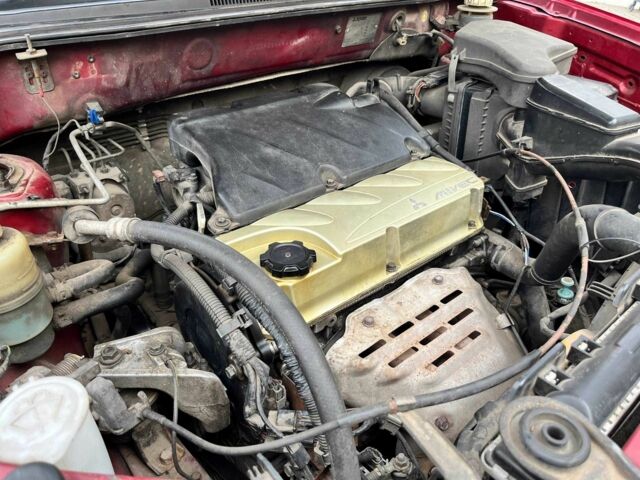 Красный Мицубиси Аутлендер, объемом двигателя 2.4 л и пробегом 174 тыс. км за 6900 $, фото 17 на Automoto.ua