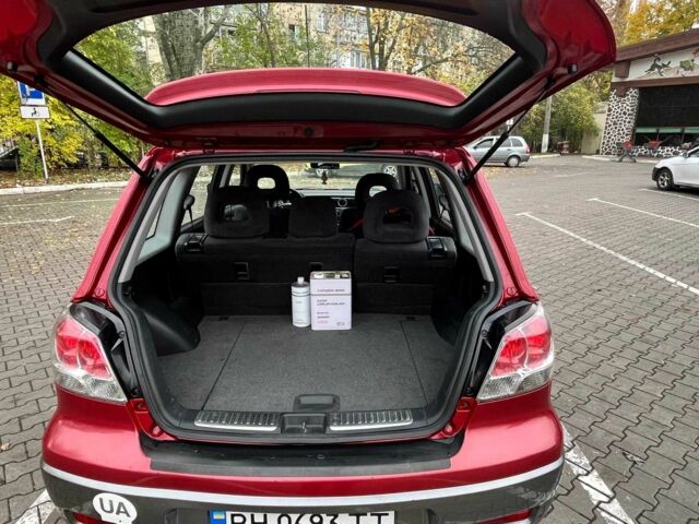 Красный Мицубиси Аутлендер, объемом двигателя 2.4 л и пробегом 174 тыс. км за 6900 $, фото 9 на Automoto.ua