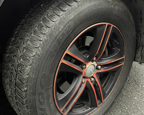 Красный Мицубиси Аутлендер, объемом двигателя 2.4 л и пробегом 224 тыс. км за 5600 $, фото 13 на Automoto.ua