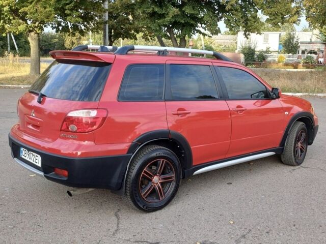 Мицубиси Аутлендер 2006 в Чернигове на Automoto.ua Красный Мицубиси Аутлендер, объемом двигателя 2.4 л и пробегом 220 тыс. км за 5499 $, фото 2 на Automoto.ua