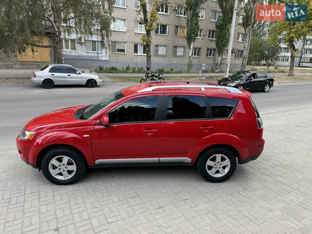 Красный Мицубиси Аутлендер, объемом двигателя 1.97 л и пробегом 198 тыс. км за 7500 $, фото 7 на Automoto.ua