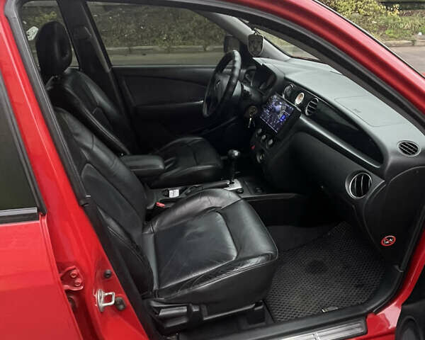 Красный Мицубиси Аутлендер, объемом двигателя 2.4 л и пробегом 224 тыс. км за 5600 $, фото 11 на Automoto.ua