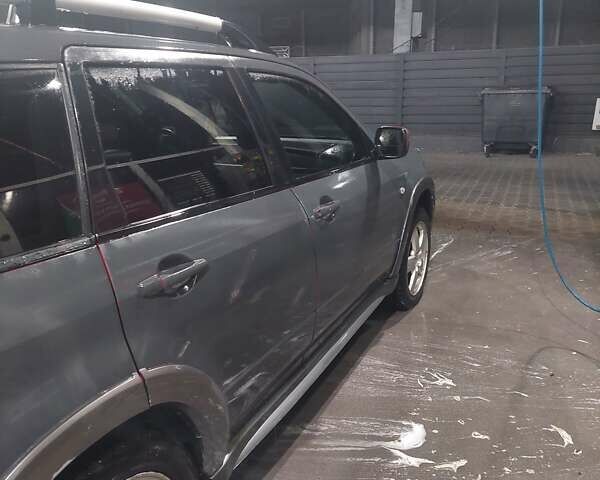 Красный Мицубиси Аутлендер, объемом двигателя 2.4 л и пробегом 470 тыс. км за 5500 $, фото 7 на Automoto.ua