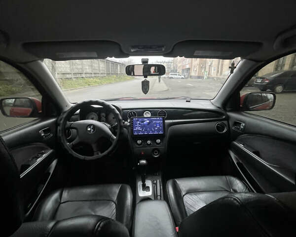 Красный Мицубиси Аутлендер, объемом двигателя 2.4 л и пробегом 224 тыс. км за 5600 $, фото 12 на Automoto.ua