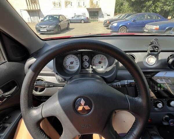 Красный Мицубиси Аутлендер, объемом двигателя 2.4 л и пробегом 193 тыс. км за 7999 $, фото 17 на Automoto.ua