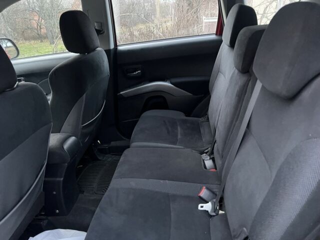 Красный Мицубиси Аутлендер, объемом двигателя 2 л и пробегом 290 тыс. км за 4700 $, фото 6 на Automoto.ua