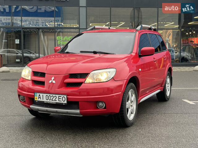 Червоний Міцубісі Аутлендер, об'ємом двигуна 2.4 л та пробігом 308 тис. км за 5990 $, фото 3 на Automoto.ua