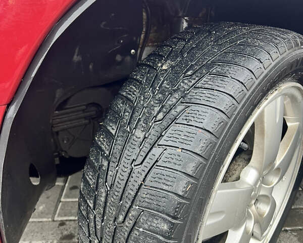 Червоний Міцубісі Аутлендер, об'ємом двигуна 2.4 л та пробігом 187 тис. км за 5600 $, фото 3 на Automoto.ua