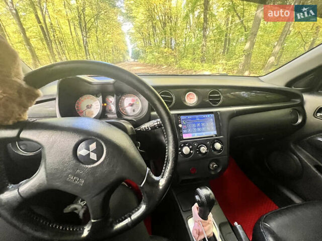 Червоний Міцубісі Аутлендер, об'ємом двигуна 2.4 л та пробігом 187 тис. км за 5600 $, фото 6 на Automoto.ua