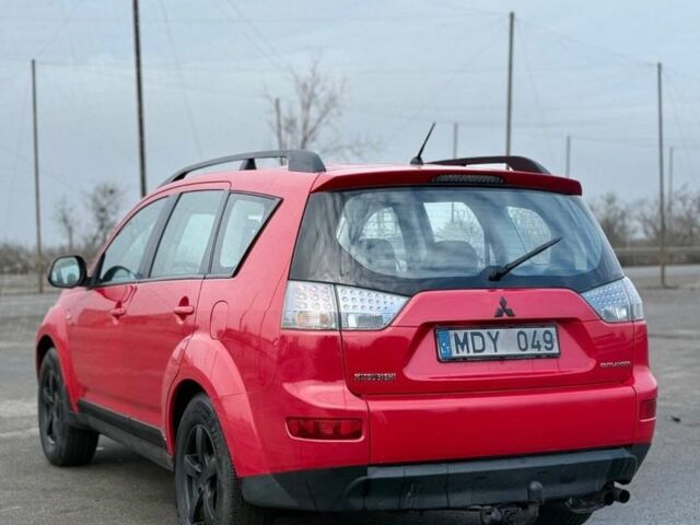 Красный Мицубиси Аутлендер, объемом двигателя 2 л и пробегом 290 тыс. км за 5200 $, фото 3 на Automoto.ua