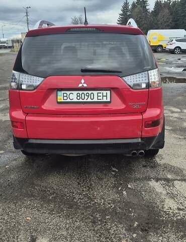 Красный Мицубиси Аутлендер, объемом двигателя 3 л и пробегом 351 тыс. км за 8000 $, фото 3 на Automoto.ua