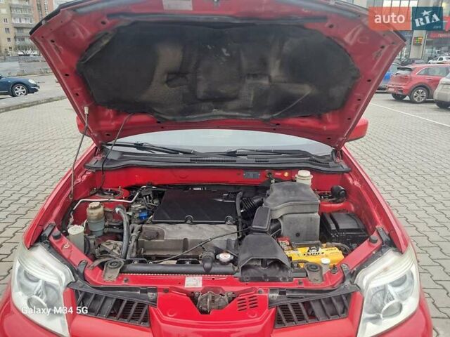 Красный Мицубиси Аутлендер, объемом двигателя 2.4 л и пробегом 269 тыс. км за 5700 $, фото 19 на Automoto.ua