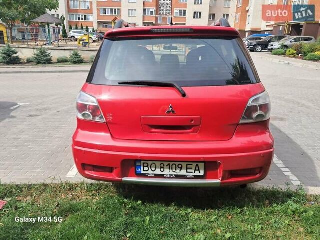 Червоний Міцубісі Аутлендер, об'ємом двигуна 2.4 л та пробігом 265 тис. км за 5300 $, фото 12 на Automoto.ua