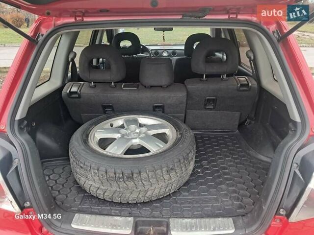 Красный Мицубиси Аутлендер, объемом двигателя 2.4 л и пробегом 269 тыс. км за 5700 $, фото 18 на Automoto.ua