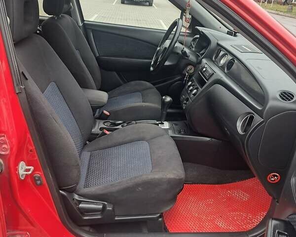 Красный Мицубиси Аутлендер, объемом двигателя 2.4 л и пробегом 269 тыс. км за 5700 $, фото 22 на Automoto.ua