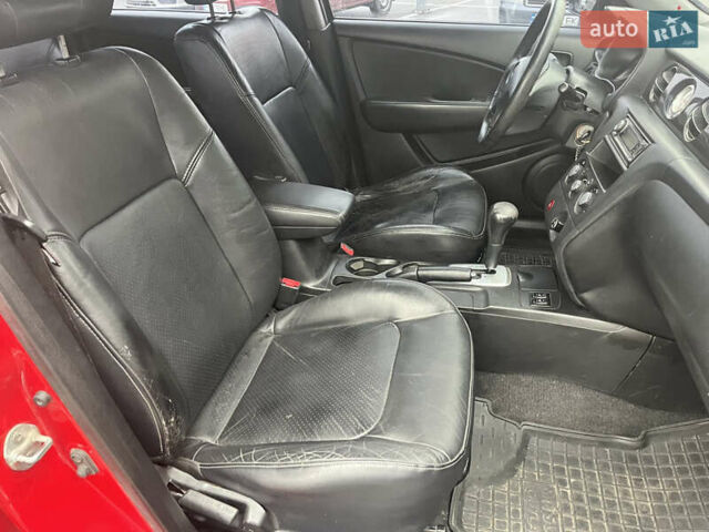 Червоний Міцубісі Аутлендер, об'ємом двигуна 2.4 л та пробігом 308 тис. км за 5990 $, фото 8 на Automoto.ua