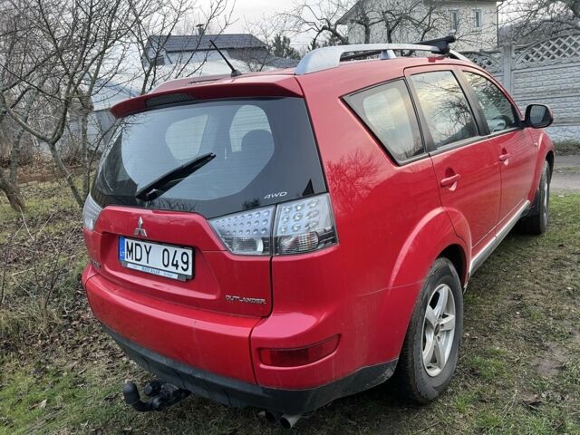 Красный Мицубиси Аутлендер, объемом двигателя 2 л и пробегом 290 тыс. км за 4700 $, фото 3 на Automoto.ua