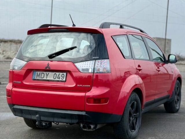 Красный Мицубиси Аутлендер, объемом двигателя 2 л и пробегом 290 тыс. км за 5200 $, фото 2 на Automoto.ua