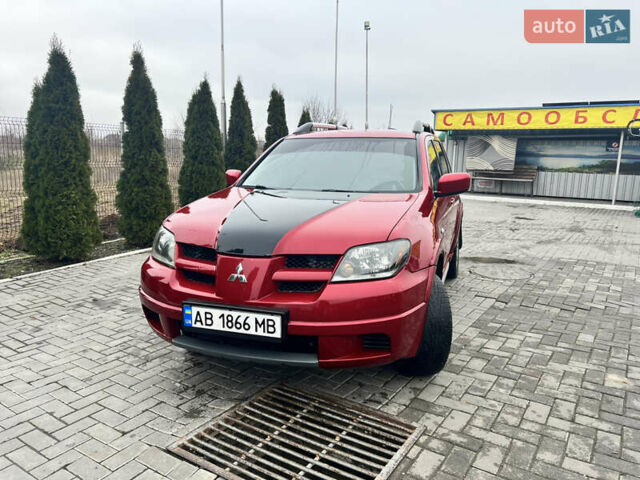 Червоний Міцубісі Аутлендер, об'ємом двигуна 2.4 л та пробігом 187 тис. км за 5600 $, фото 5 на Automoto.ua