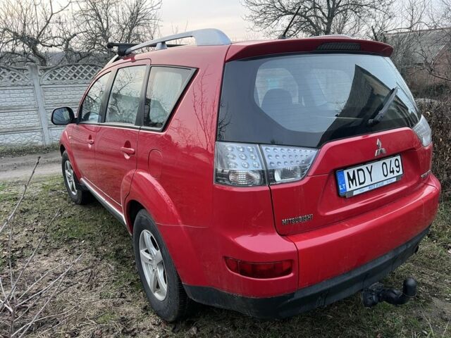 Красный Мицубиси Аутлендер, объемом двигателя 2 л и пробегом 290 тыс. км за 4700 $, фото 4 на Automoto.ua