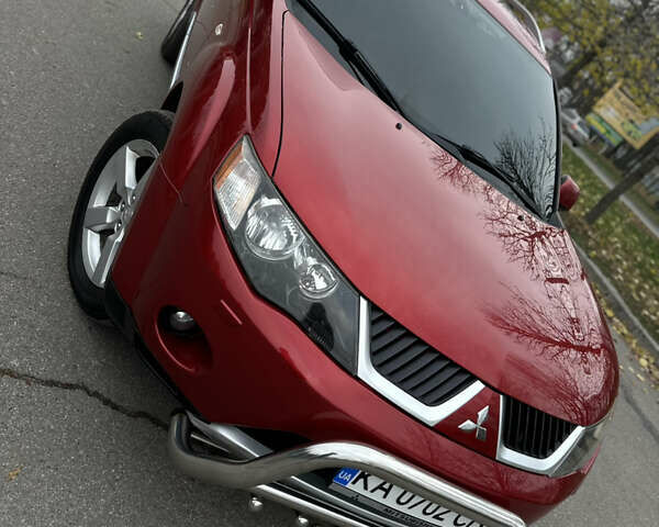 Красный Мицубиси Аутлендер, объемом двигателя 2.4 л и пробегом 180 тыс. км за 8900 $, фото 25 на Automoto.ua