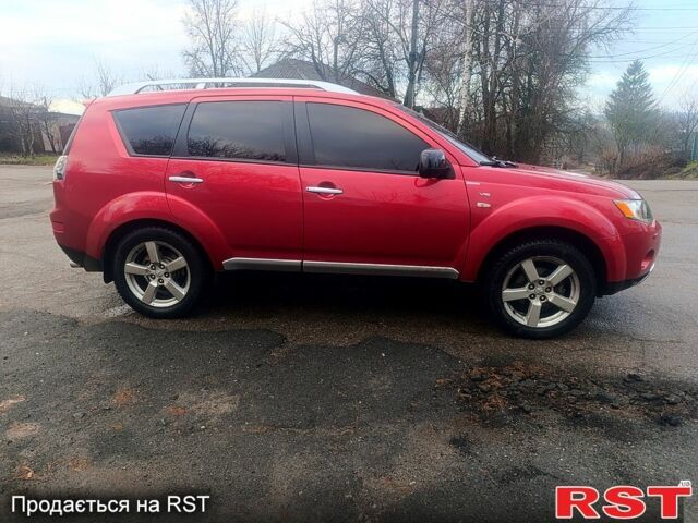 Красный Мицубиси Аутлендер, объемом двигателя 3 л и пробегом 205 тыс. км за 9000 $, фото 5 на Automoto.ua