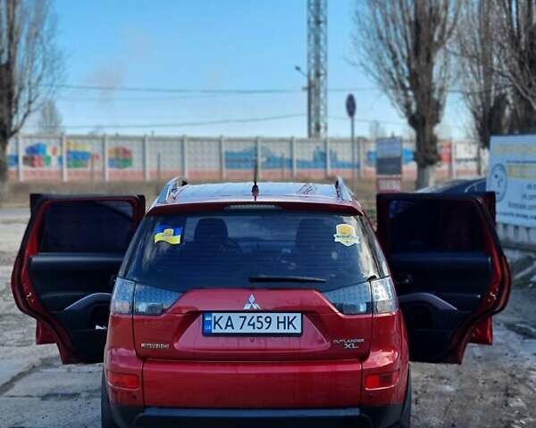 Червоний Міцубісі Аутлендер, об'ємом двигуна 3 л та пробігом 120 тис. км за 9000 $, фото 1 на Automoto.ua