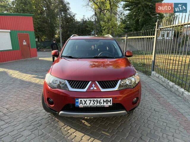 Красный Мицубиси Аутлендер, объемом двигателя 2.36 л и пробегом 143 тыс. км за 8500 $, фото 8 на Automoto.ua