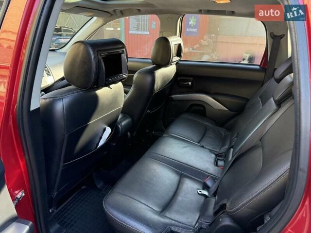 Красный Мицубиси Аутлендер, объемом двигателя 2.36 л и пробегом 143 тыс. км за 8500 $, фото 14 на Automoto.ua