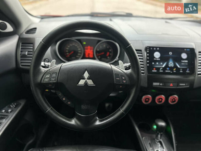 Красный Мицубиси Аутлендер, объемом двигателя 2.4 л и пробегом 180 тыс. км за 8900 $, фото 36 на Automoto.ua