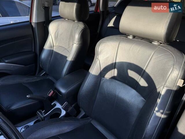 Красный Мицубиси Аутлендер, объемом двигателя 2.36 л и пробегом 143 тыс. км за 8500 $, фото 6 на Automoto.ua