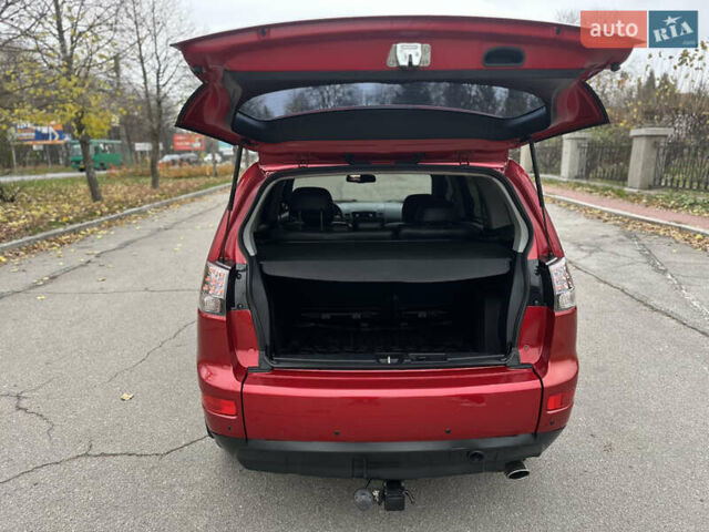 Красный Мицубиси Аутлендер, объемом двигателя 2.4 л и пробегом 180 тыс. км за 8900 $, фото 45 на Automoto.ua