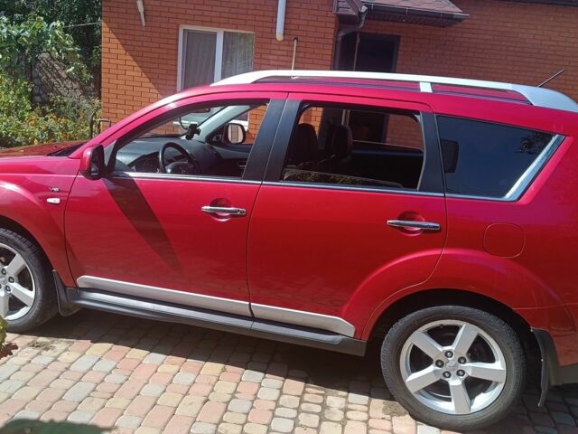 Червоний Міцубісі Аутлендер, об'ємом двигуна 3 л та пробігом 178 тис. км за 9500 $, фото 1 на Automoto.ua