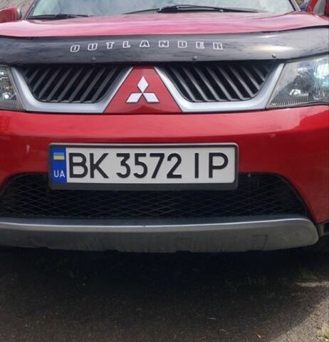 Червоний Міцубісі Аутлендер, об'ємом двигуна 2.4 л та пробігом 230 тис. км за 9200 $, фото 2 на Automoto.ua