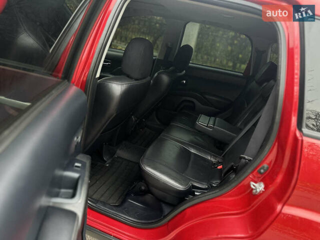 Красный Мицубиси Аутлендер, объемом двигателя 2.4 л и пробегом 180 тыс. км за 8900 $, фото 31 на Automoto.ua
