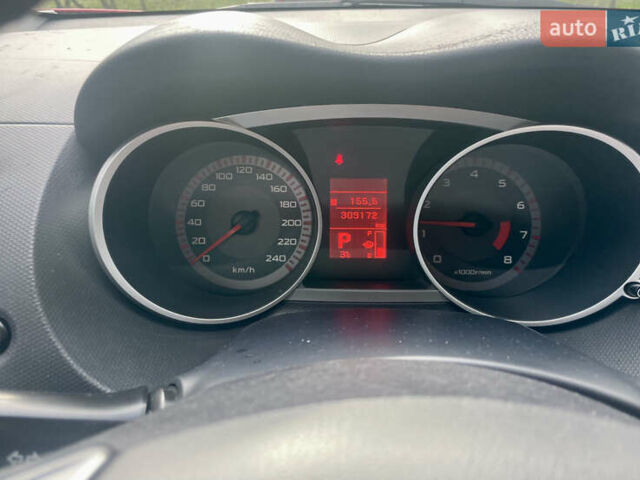 Красный Мицубиси Аутлендер, объемом двигателя 2.36 л и пробегом 306 тыс. км за 9300 $, фото 6 на Automoto.ua