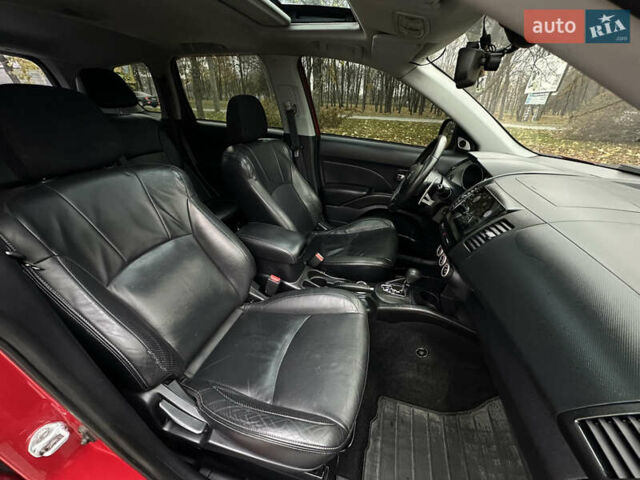 Красный Мицубиси Аутлендер, объемом двигателя 2.4 л и пробегом 180 тыс. км за 8900 $, фото 43 на Automoto.ua