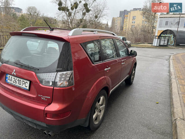 Красный Мицубиси Аутлендер, объемом двигателя 3 л и пробегом 204 тыс. км за 8200 $, фото 4 на Automoto.ua