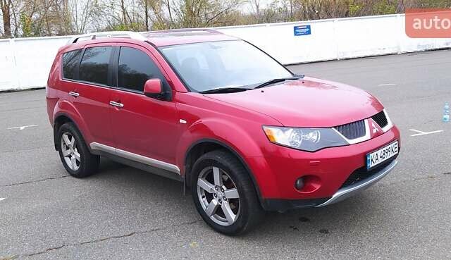 Красный Мицубиси Аутлендер, объемом двигателя 3 л и пробегом 260 тыс. км за 9000 $, фото 1 на Automoto.ua