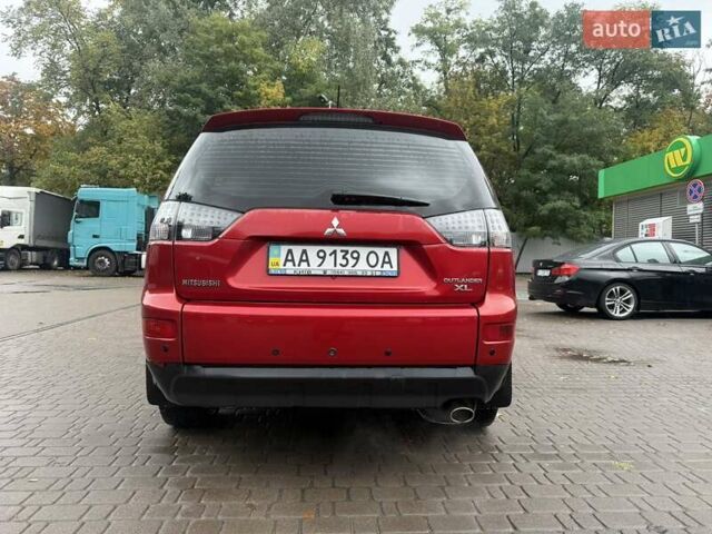 Міцубісі Аутлендер 2009 у Києві на Automoto.ua Червоний Міцубісі Аутлендер, об'ємом двигуна 2.36 л та пробігом 157 тис. км за 11499 $, фото 4 на Automoto.ua