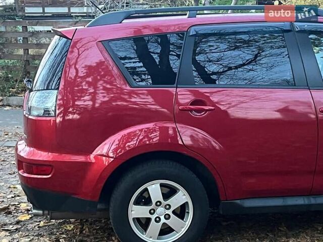 Красный Мицубиси Аутлендер, объемом двигателя 2.4 л и пробегом 251 тыс. км за 8990 $, фото 12 на Automoto.ua