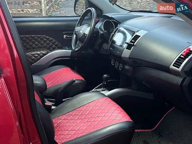 Красный Мицубиси Аутлендер, объемом двигателя 2.4 л и пробегом 251 тыс. км за 8990 $, фото 14 на Automoto.ua