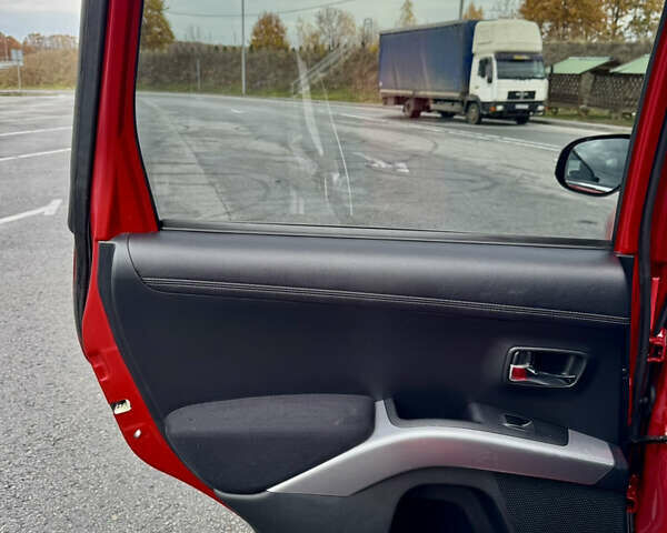 Красный Мицубиси Аутлендер, объемом двигателя 2 л и пробегом 204 тыс. км за 10350 $, фото 30 на Automoto.ua