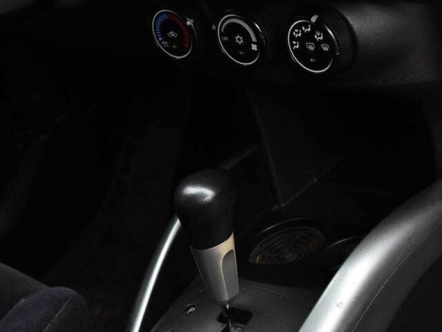 Красный Мицубиси Аутлендер, объемом двигателя 2.4 л и пробегом 204 тыс. км за 9499 $, фото 15 на Automoto.ua