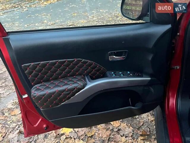 Красный Мицубиси Аутлендер, объемом двигателя 2.4 л и пробегом 251 тыс. км за 8990 $, фото 24 на Automoto.ua