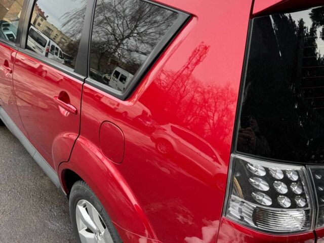 Красный Мицубиси Аутлендер, объемом двигателя 2.4 л и пробегом 201 тыс. км за 9750 $, фото 6 на Automoto.ua
